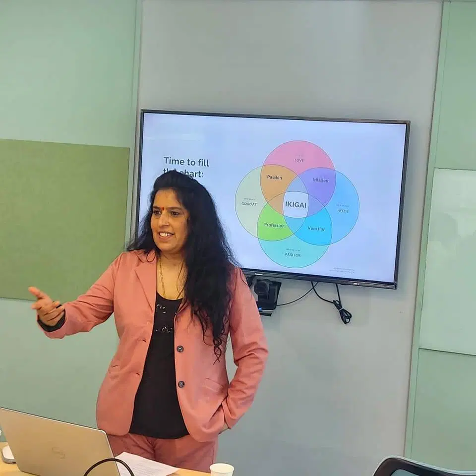 Dr. Ruupa Rao presenting on identity and behaviour — Ahmedabad Mirror feature